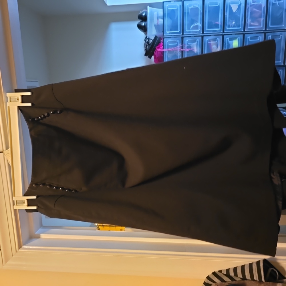 Black skirt with beaded waist and cute fan out hem line in back